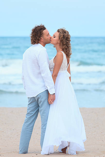 istock Young Couple On The Beach 471894565