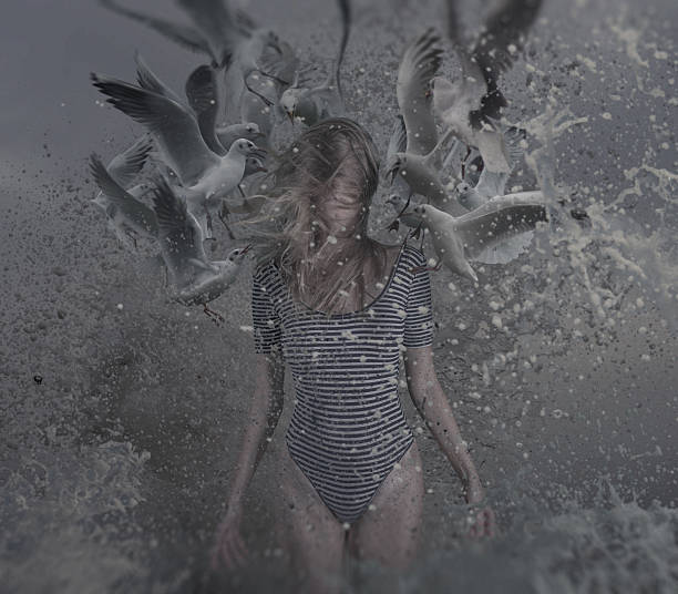 istock young women in water splashes with sea gulls 471895523