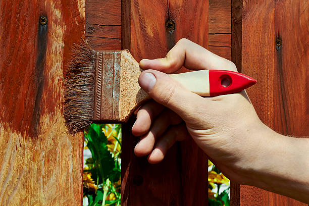 istock Painting wooden fence 471897026