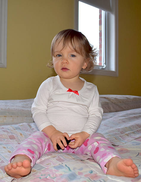istock Cute, Blue Eyed Baby with Blond Curls 471897478