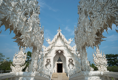 Wat Rong Khun (The White Temple), Chiangrai Province, North of  Thailand. The great art of temple you must see when you come to Thailand.