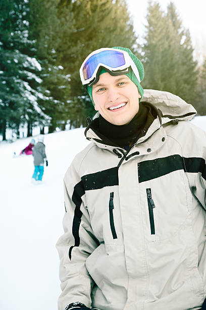 istock Smiling young male skier on the slopes 471898761