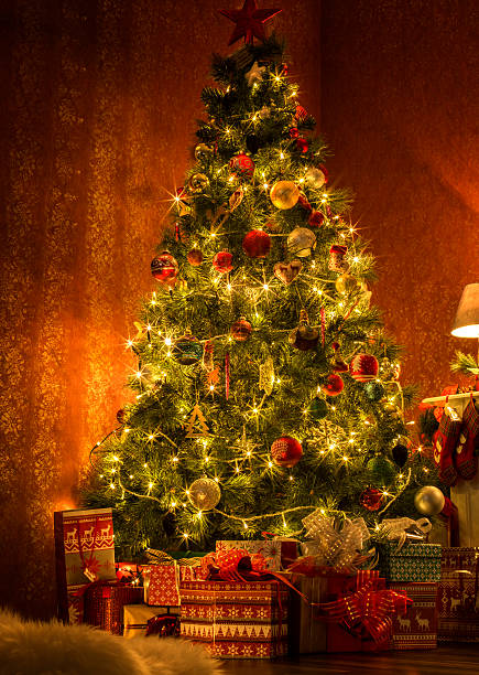 istock Decorated Christmas Tree with Presents and Fireplace with Champagne 471899109