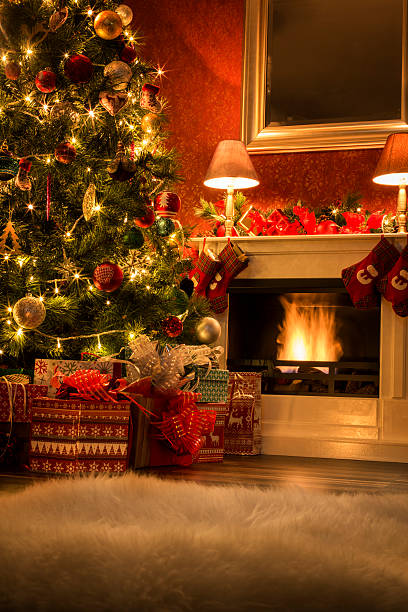 istock Decorated Christmas Tree with Presents and Fireplace with Champagne 471899111