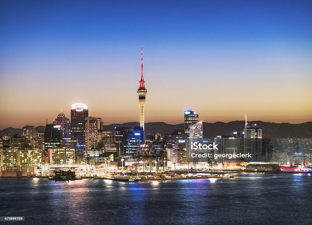 Auckland Skyline at Dusk The Sky Tower in the centre of the buildings of Auckland's CBD, taken after sunset. Auckland Stock Photo