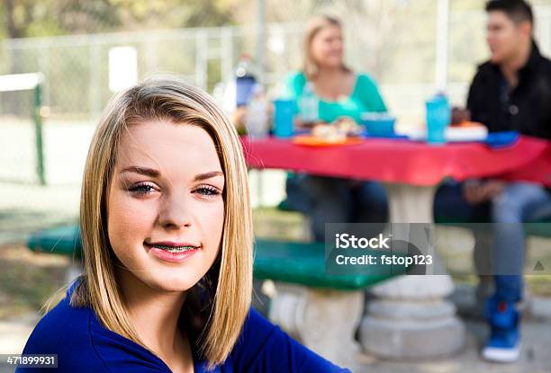 Teenagers Blond Teenage Girl At Family Picnic Stock Photo - Download Image Now - 20-29 Years, Adolescence, Adult