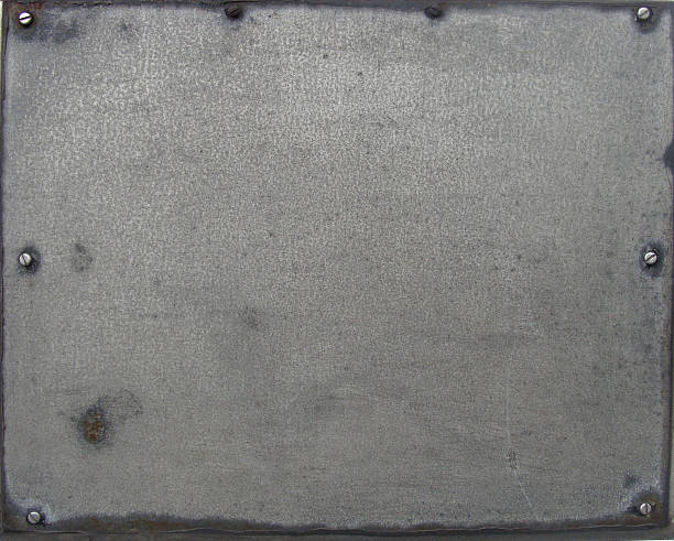 istock screwed metal plate sheet with some rust and wear 471900541