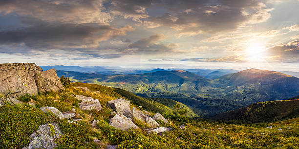 istock stones in valley on top of mountain range at sunset 471900736