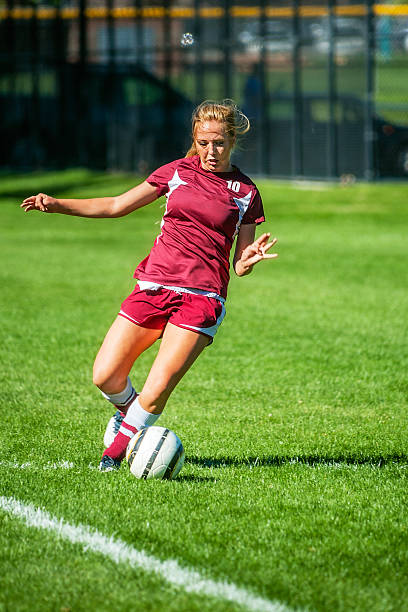 istock Soccer Girl's Graceful Ball Approach with Copy Space 471901609