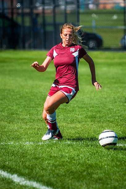 istock Soccer Girl Approaching Ball with Copy Space 471901837