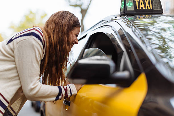istock Barcelona, Woman Catching a Cab 471902145