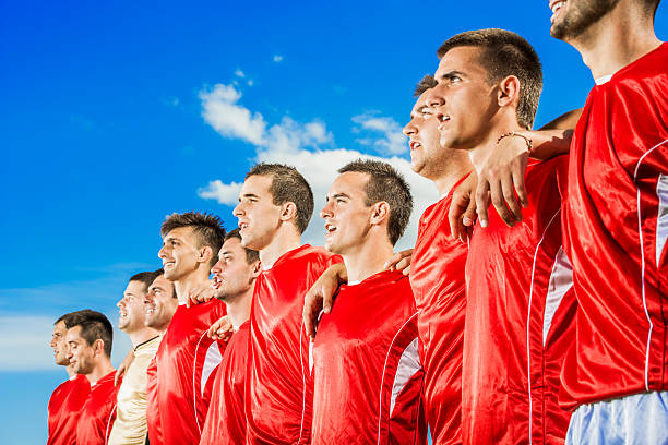 istock Soccer team singing national anthem. 471902303