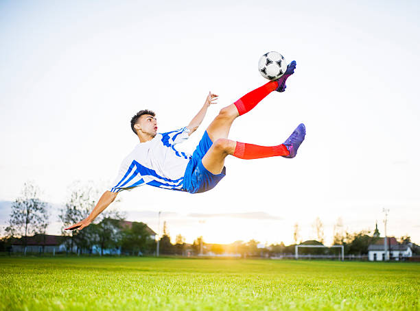 istock Soccer player kicking the ball. 471902307