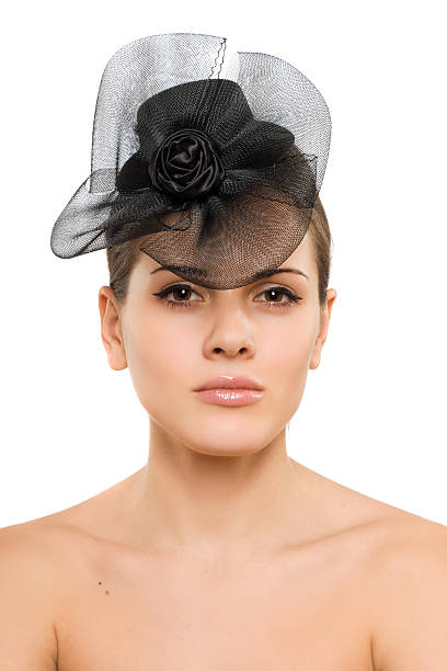 istock young woman with a bow in her hair 471902333