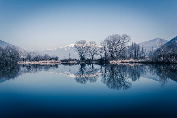 istock cold lake at winter, Torbiere del Sebino 471905032