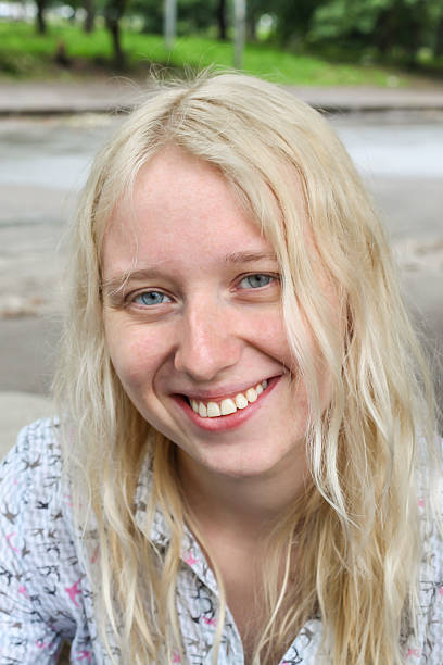 istock Young blonde girl laughing 471905150