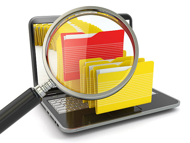 istock Search folder. Laptop, loupe and files. 471905293