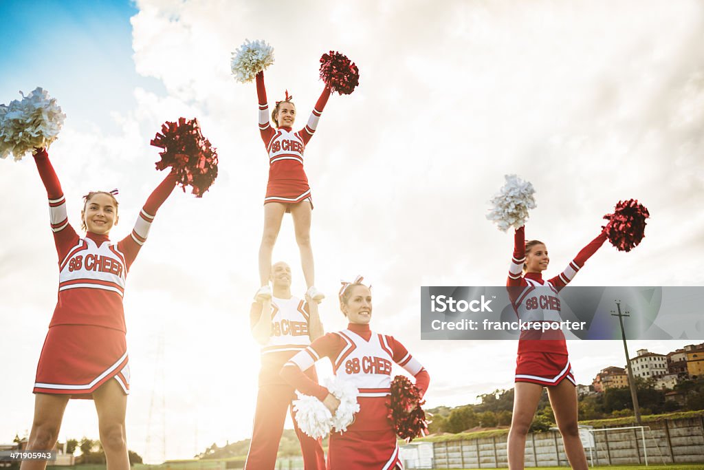 Happiness Cheerleaders Posing With Ponpon Stock Photo - Download Image Now  - Cheerleader, Human Pyramid, Pom-Pom - iStock