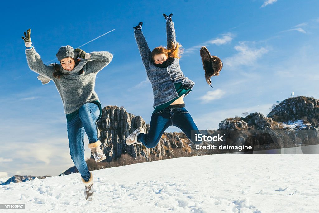 Girls are having fun with the snow lifestyle outdoor 14-15 Years Stock Photo