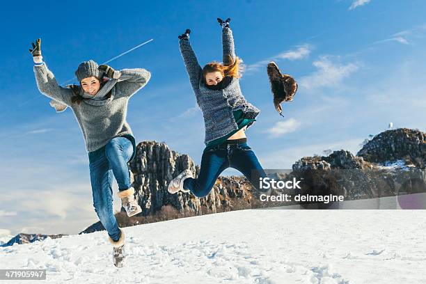 Girls Are Having Fun With The Snow Stock Photo - Download Image Now - 14-15 Years, 16-17 Years, 18-19 Years