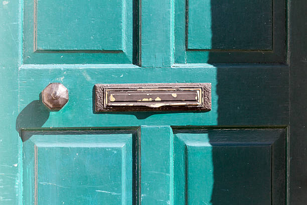 istock Green Door with bronze iron door-handle and jai-drop box 471905962