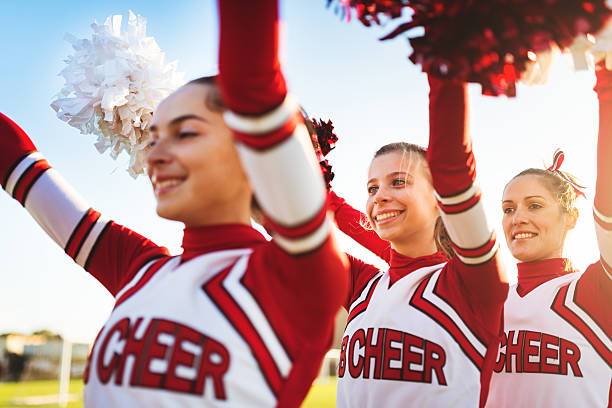istock Happiness cheerleaders posing with pon-pon 471906183