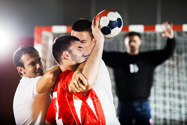 istock Group of handball players in action. 471906691