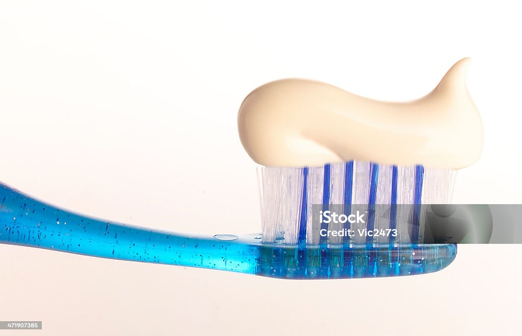 Spazzolino da denti - Foto stock royalty-free di Accudire
