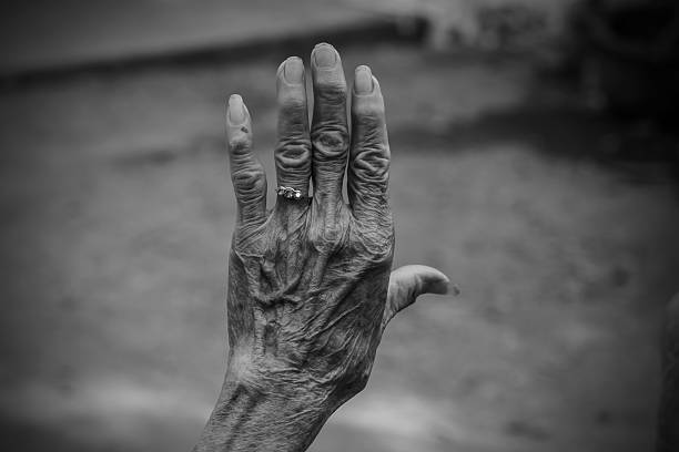 istock Hands of the old woman. Black and White. 471908802