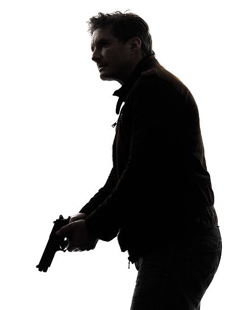 istock Policeman awaits the killer in the shadows 471909033