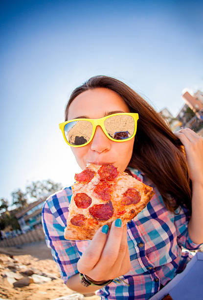 istock Hipster Wearing Sunglasses Eating Pizza 471909115