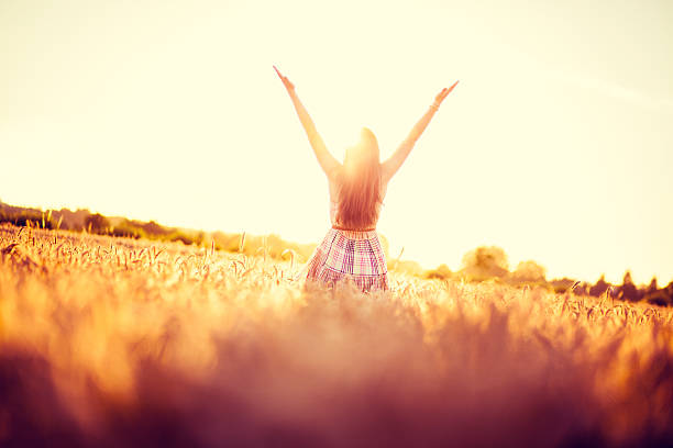 istock Hand Raised Woman In Field 471909131