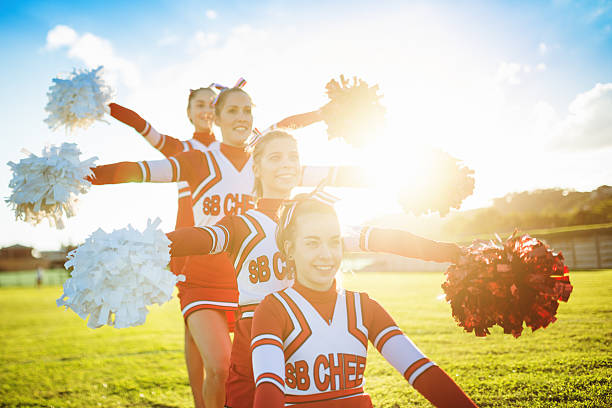 istock Happiness cheerleaders posing with pon-pon 471910071