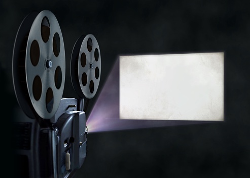 Macro image of a light-leak on a roll of photographic color negative film, on a white background.