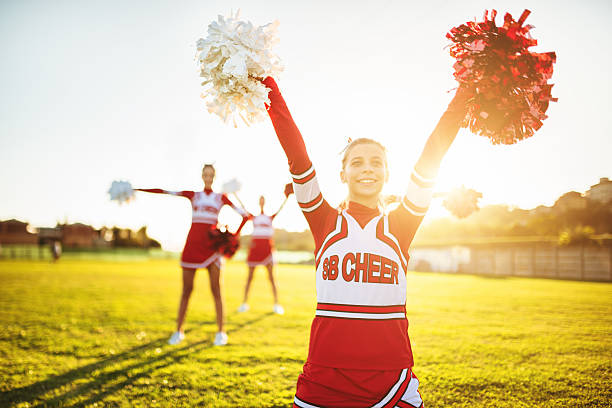 istock Happiness cheerleaders posing with pon-pon 471910139