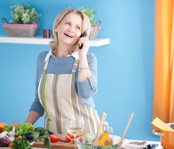istock Senior woman cooking. 471910241