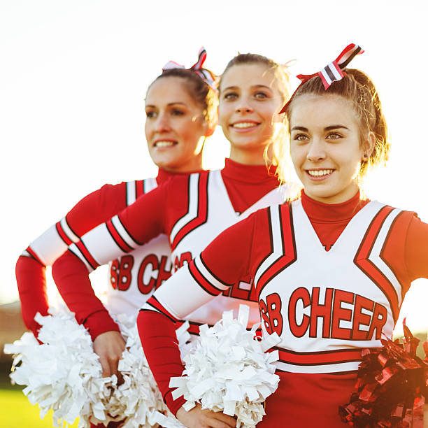 istock Happiness cheerleaders posing with pon-pon 471910351