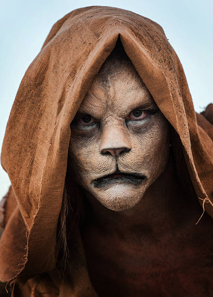 Lion Man Hooded Lion Man (Stock Image) cat face paint stock pictures, royalty-free photos & images