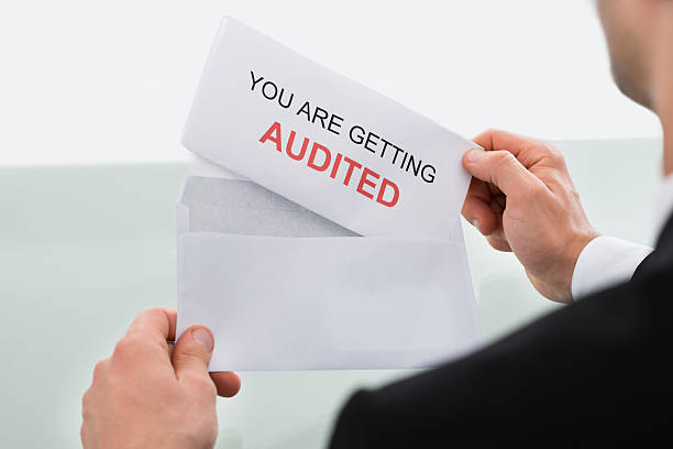 istock Businessman Opening Audit Letter In Office 471912552
