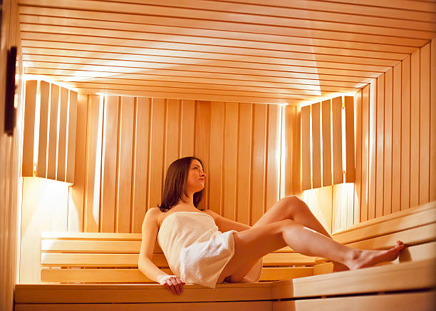 istock Young woman in the sauna 471913525
