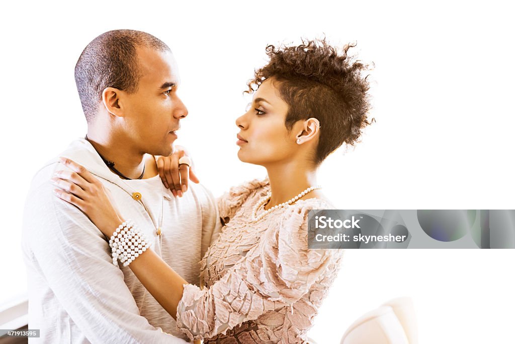 African American couple. African American couple looking at each other. Isolated on white.    30-39 Years Stock Photo