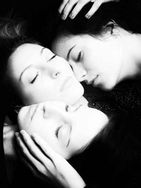 istock Three Woman with Eyes Closed. Black and White 471915429