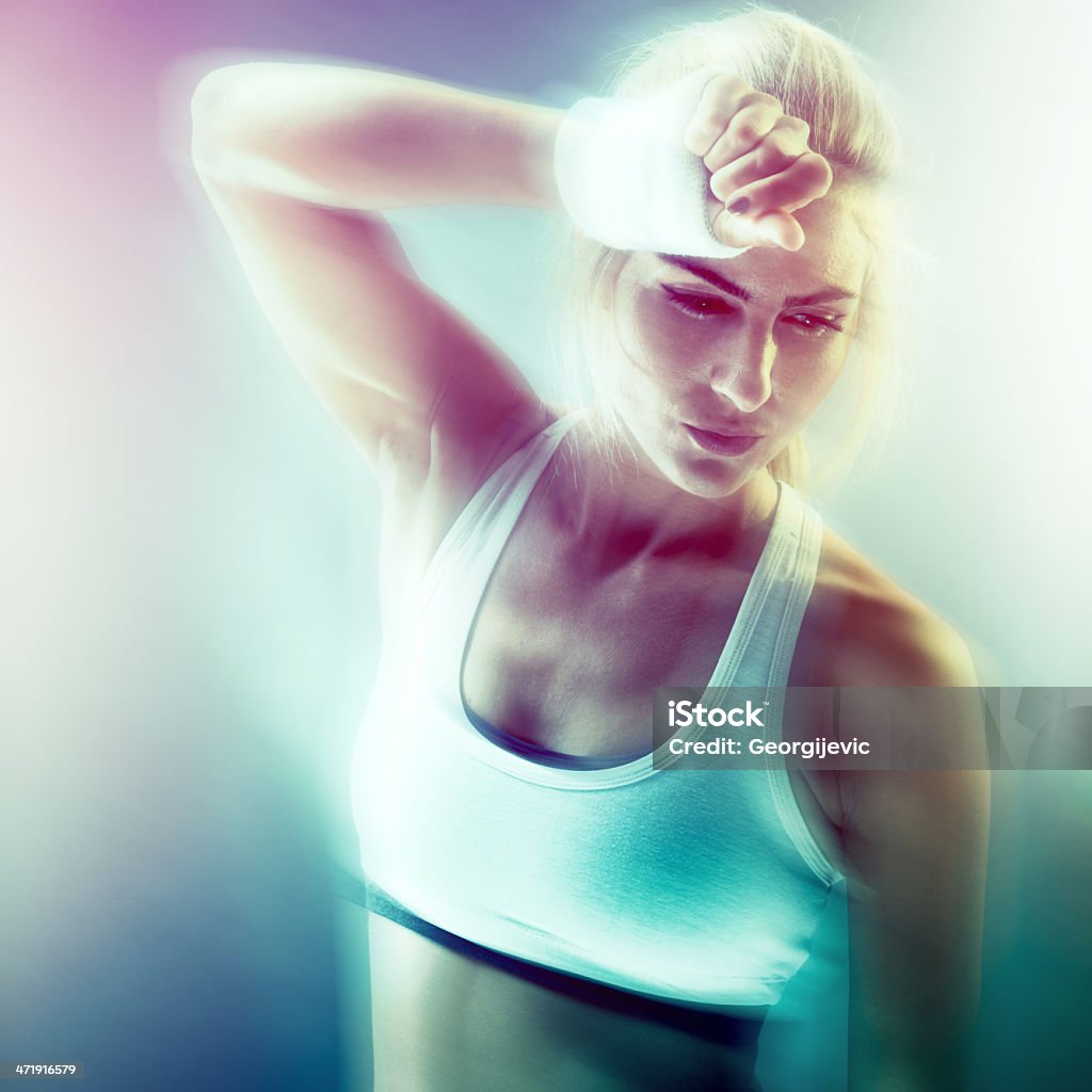 Fitness woman Abstract portrait of sporty woman taking breath after training. Abstract Stock Photo