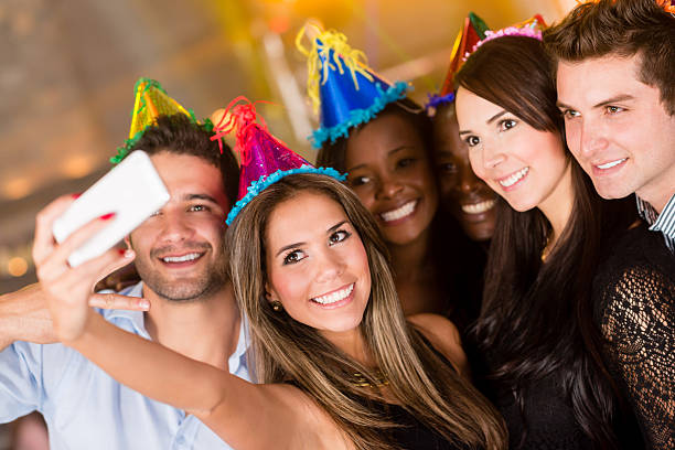 istock Party friends taking a self portrait 471919167