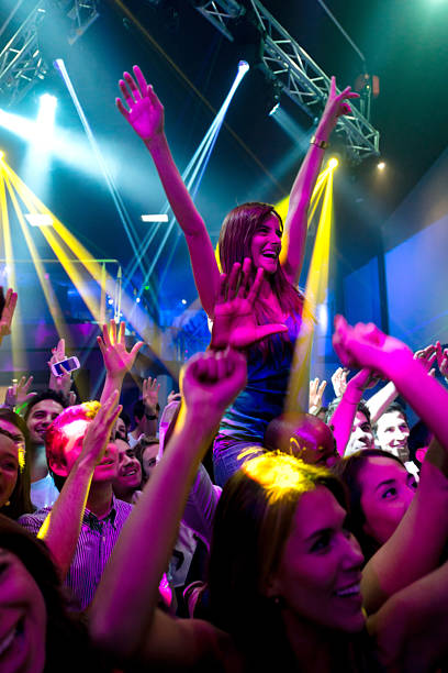 istock Happy woman at a concert 471919437