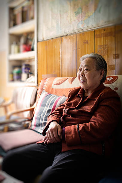 istock My grandmother resting on the couch 471920857