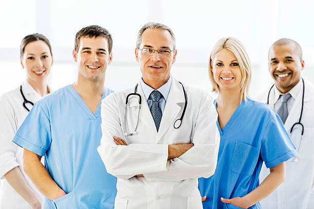 istock Doctors, surgeons and health care workers smiling 471920875