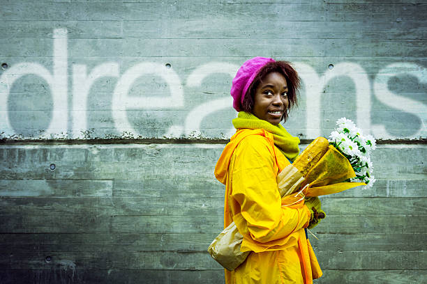 Young woman following her dreams Young woman following her dreams, positively. cool graffiti characters stock pictures, royalty-free photos & images