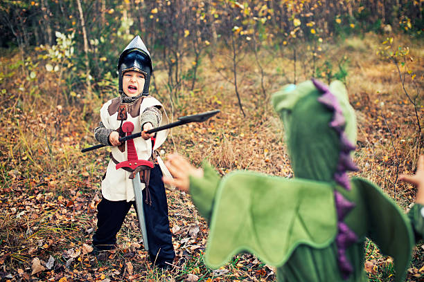 istock Knight fighting with green dragon. 471921591