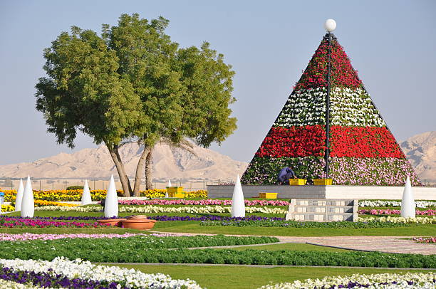 Al Ain, UAE - December 26, 2011: Al Ain Paradise Gardens in the UAE. It holds the Guinness World Record for the most hanging baskets, having 2,968 in total.